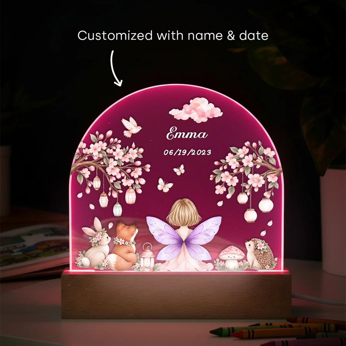 Fairy night light with purple wings in pink light, customized with name and date